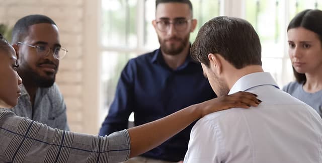 A support group meeting for PMO recovery