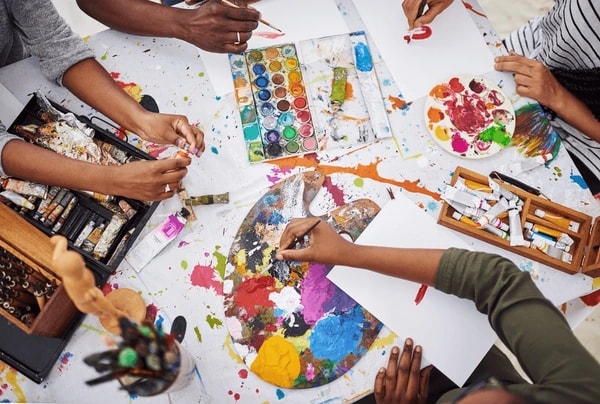 Person engaging in a creative hobby, like painting