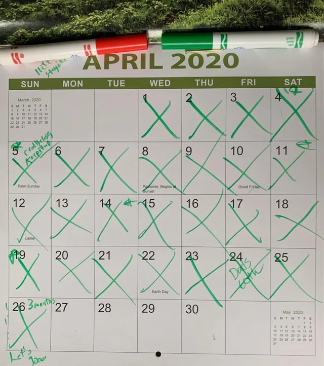 Person celebrating success, with a calendar marking days without porn